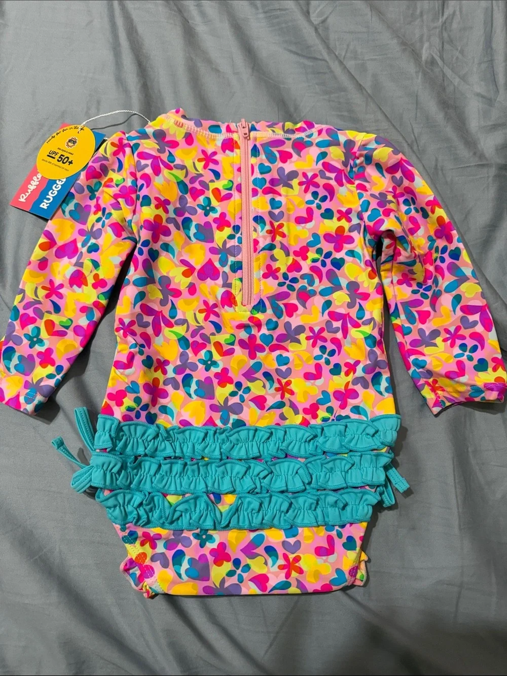 Ruffle Butts Neon Floral One-Piece Swimsuit in Pink, Yellow, Blue & Purple